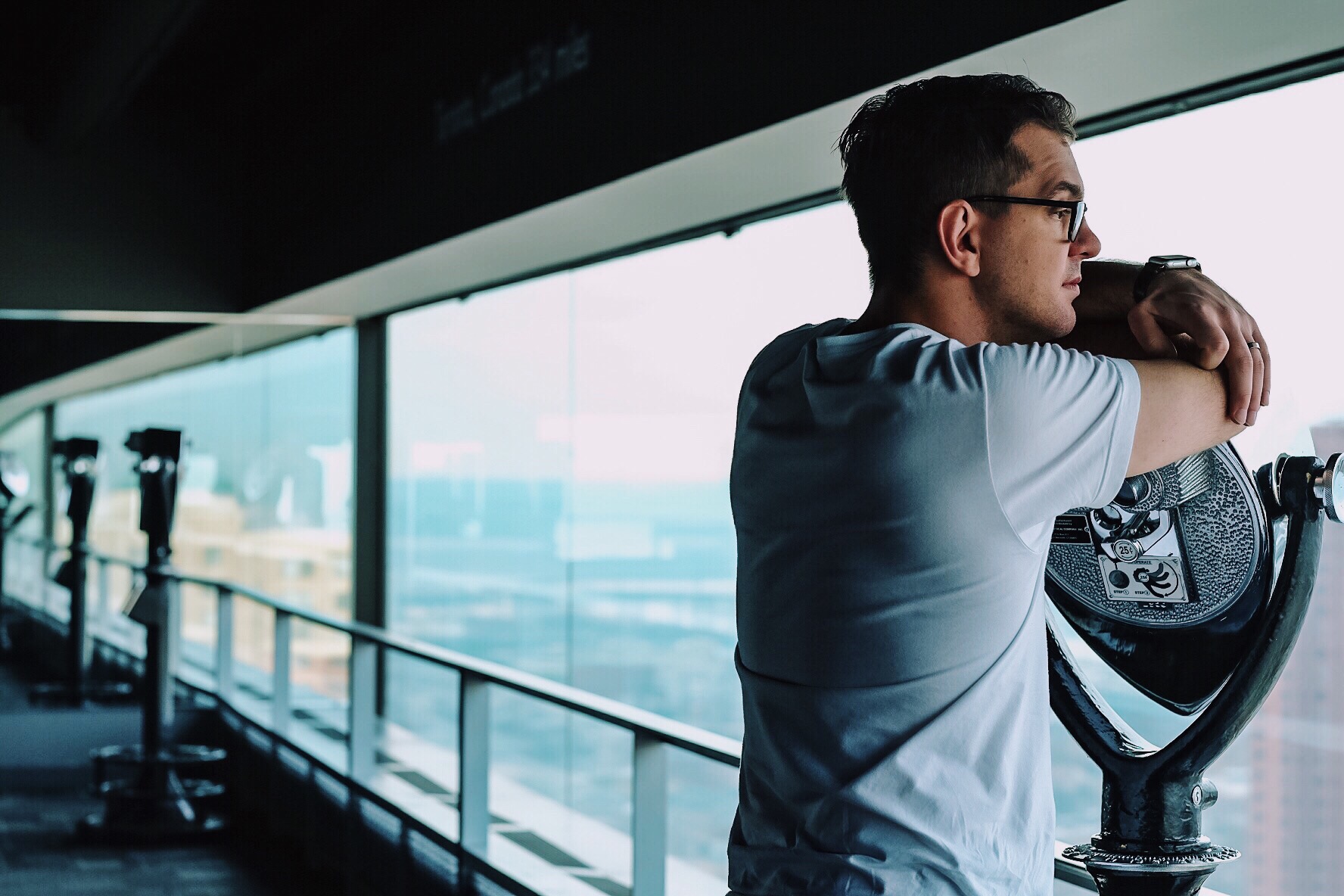 Day 1 - Man overlooking city view